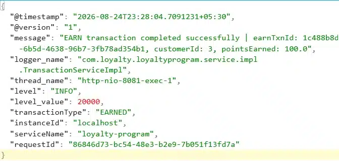 JSON log with earnTxnId, customerId, pointsEarned embedded inside the message string